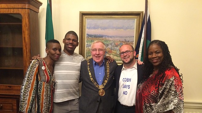 Christy Burke (center), the Lord Mayor of Dublin, with members of the Detroit Water Brigade (from left to right): Makita Taylor, DeMeeko Williams, Justin Wedes, and Shamayim Harris.