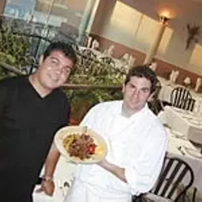 Il Gabbiano's co-owner/chefs Joe Fallea and Jonathan Rheaume serve grilled veal chop with saut&eacute;ed wild mushrooms.