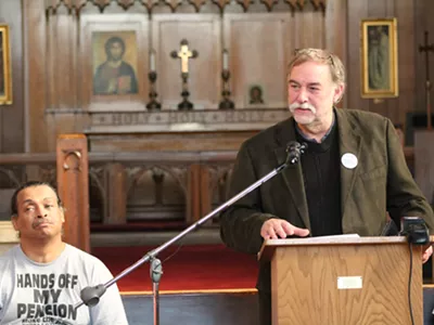 Rev. Bill Wylie-Kellermann, of the St. Peter's Episcopoal Church, speaks during a press conference on Nov. 10, 2014.