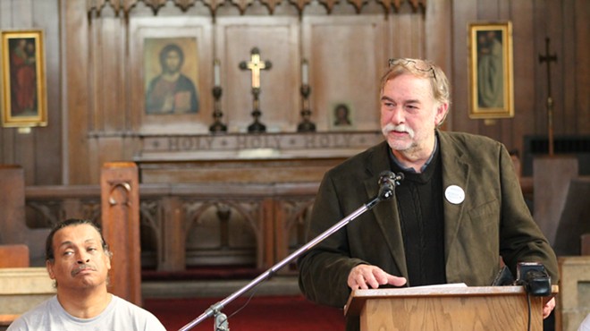 Rev. Bill Wylie-Kellermann, of the St. Peter's Episcopoal Church, speaks during a press conference on Nov. 10, 2014.