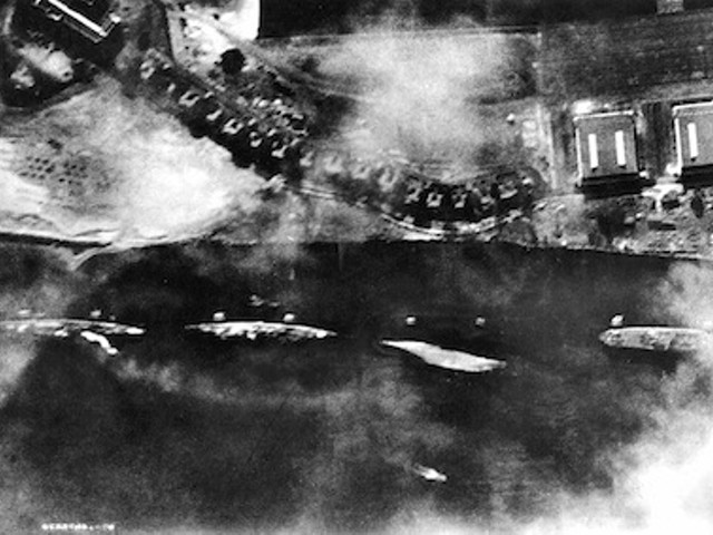 The western side of Ford Island on Dec. 7, 1941, during the attack. Farthest to the left is the USS Detroit, which was damaged that day.