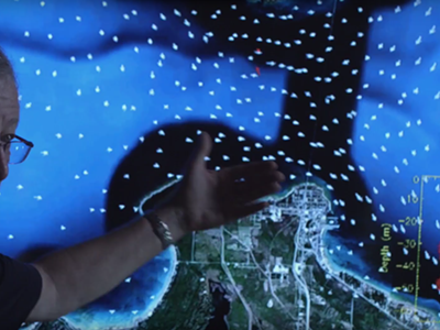 Oceanographer and hydrodynamics expert David Schwab shows a simulation of the currents in the Straits of Mackinac.