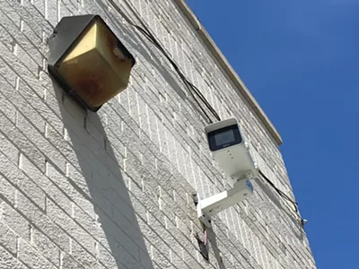 A Project Green Light camera at State Farm Insurance on 7 Mile and Livernois. The real-time crime monitoring program is drawing scrutiny as it expands to Detroit schools.