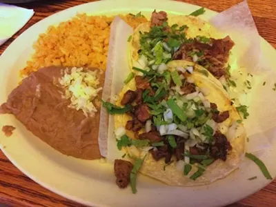 Taco lunch with tacos al pastor and asada.