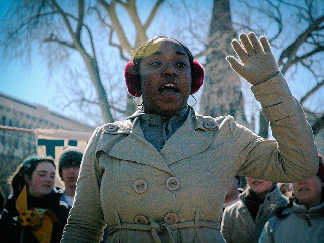 Siwatu-Salama Ra, then 15 years old, pictured speaking at an environmental justice rally in Wisconsin.