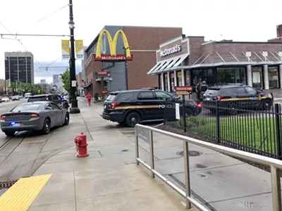 Image: Customer in wheelchair fires taser at McDonald's employee in Detroit