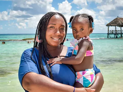 Siwatu-Salama Ra and one of her daughters.