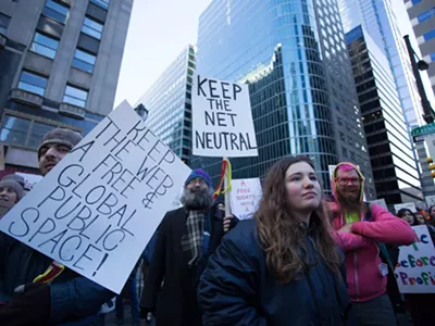 Protestors advocating for net neutrality rally outside the headquarters of the Comcast Corporation in Philadelphia, Saturday, Jan. 13, 2018.