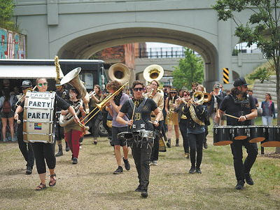 DPMB performing along the Dequindre Cut in 2018.