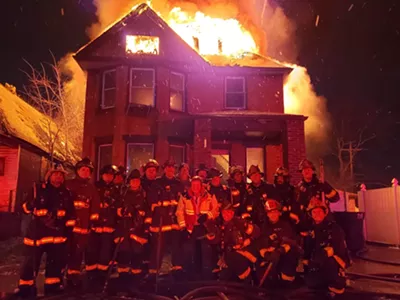 Image: Burning home used as backdrop for Detroit firefighters' photo was not abandoned