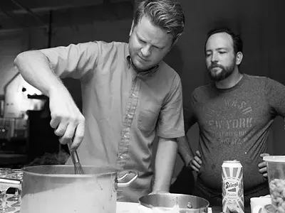 Joe Robinson, left, Brendon Edwards, right, during a popup dinner over the summer.