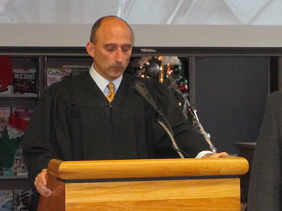 Judge Paul J. Paruk presiding over the inauguration of incoming and re-elected members of Hamtramck's City Council this January.