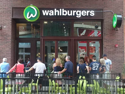 A steady stream of chain restaurants like Wahlburgers have been popping up in and around downtown Detroit this year.