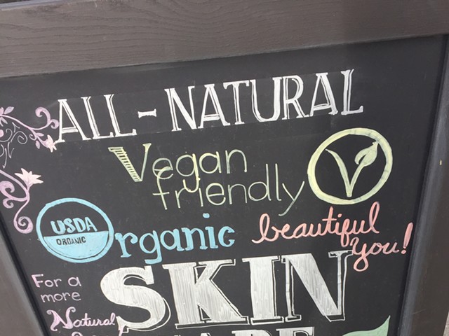 Advertisement for "gluten-free" beauty products taken outside a store in Buffalo, New York.