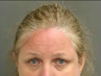 Image: Michigan woman arrested for choking teenager at Disney World