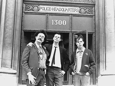 John Sinclair, Joe Mulkey and Billy Reid of the Detroit Artists Workshop after obtaining the license to hold the Love-In from the City of Detroit at Police Headquarters at 1300 Beaubien in the spring of 1967.