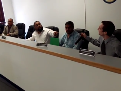 A still taken from the videos posted on YouTube of today's acrimonious City Council meeting in Hamtramck.