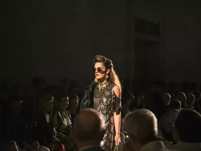 A model walks the runway at Fash Bash inside the DIA.