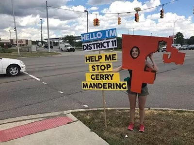 A Voters Not Politicians volunteer dressed up as a gerrymandered district.