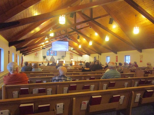 An audience eager to hear sympathetic perspectives on refugees at Waterford’s Christ Lutheran Church.