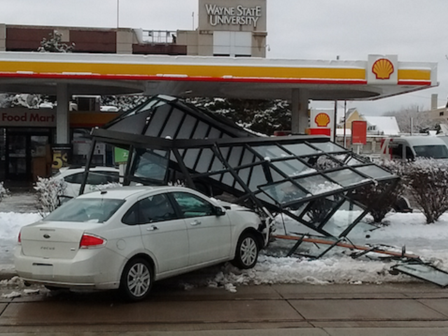 A shattered bus shelter in front of Shell Gas, 4661 Woodward Ave., Detroit.