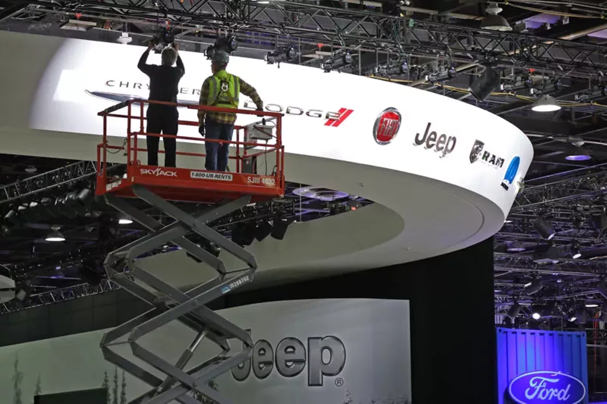 Image: Workers setting up NAIAS at Cobo Center.