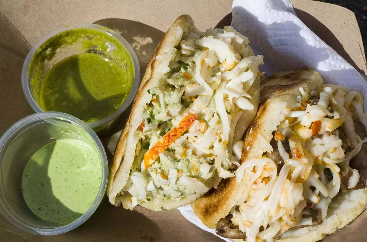 Image: “Queen” and pork arepas from Papelon Arepa Bar.