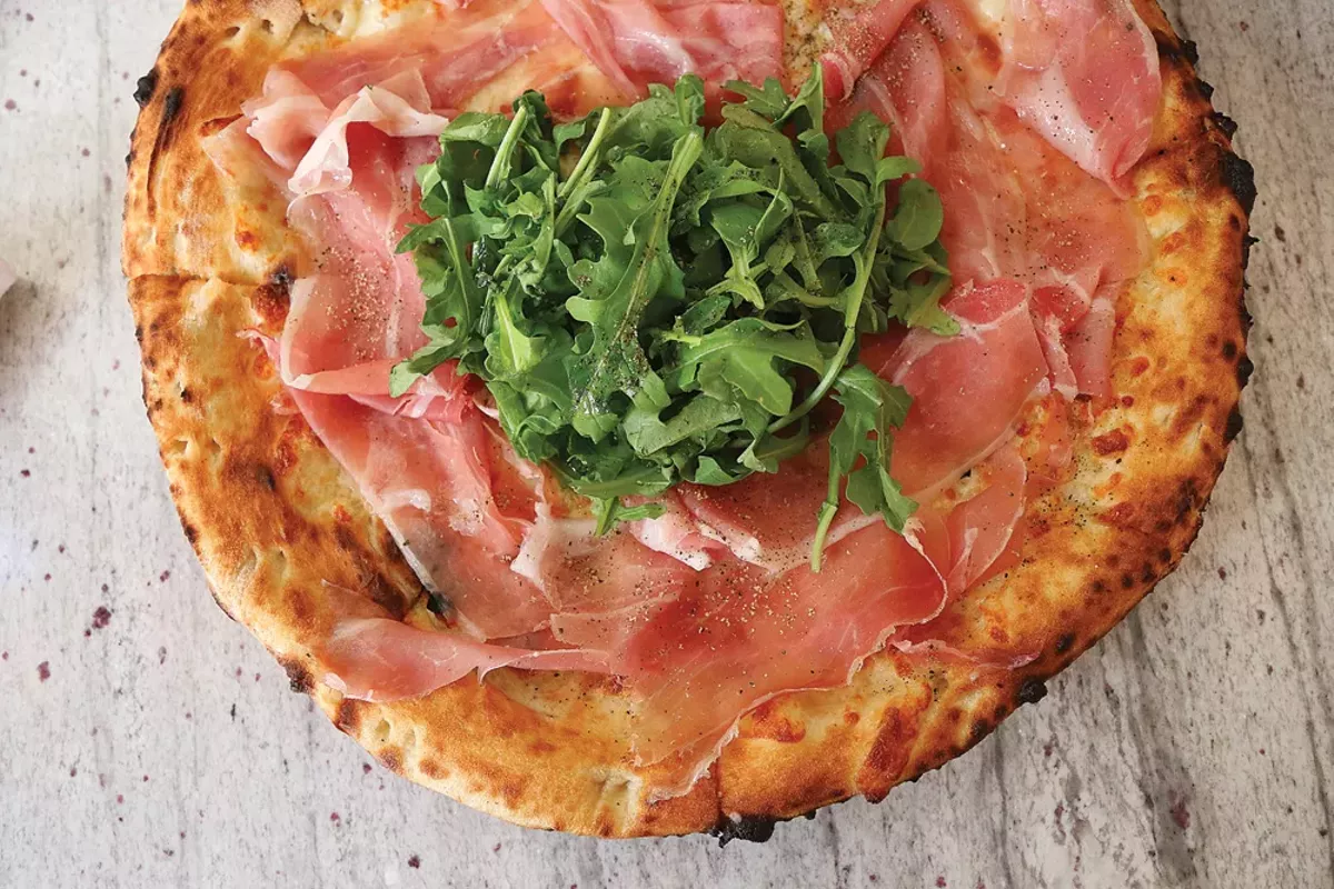Image: Bianca Pizza - EVOO, burrata, prosciutto San Daniele, arugula