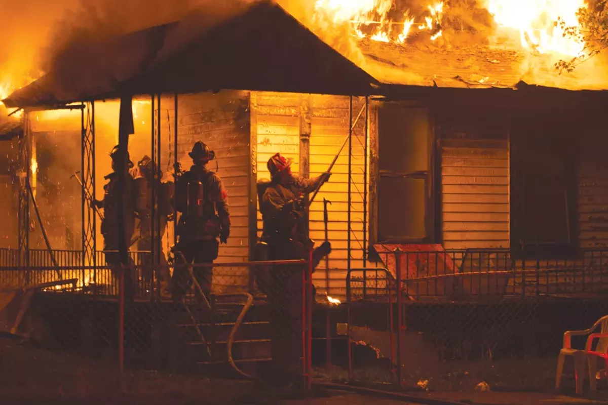 Image: Detroit firefighters work to extinguish a blaze at 3383 15th St. on July 2, 2015.