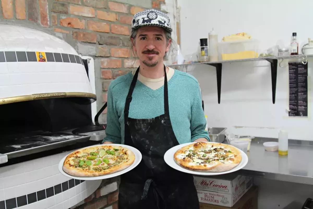 Image: Matt Ziolkowski, aka “Pepe Z,” shows off his creations “West Vernor Taco Truck” and the “Brussel Street Hustle.”