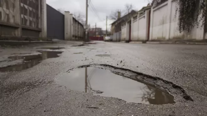 Image: Here comes the official event for eating cereal out of potholes in Detroit (2)