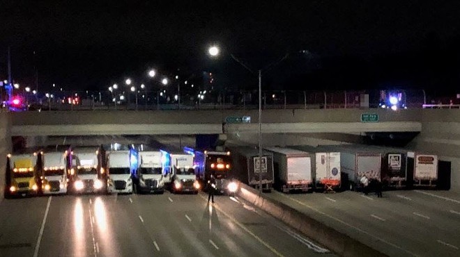 Police coordinated 13 semi-trucks on I-696 to brace fall of suicidal man