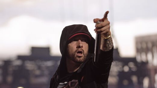 Eminem's manager fires back after rapper blasted for using gunshot sound effects