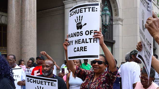 Protesters fight Michigan's Medicaid work requirements outside the Detroit office of gubernatorial candidate and Attorney General Bill Schuette.