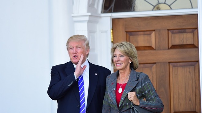 President-elect Donald Trump meets with Betsy DeVos at Trump International in Bedminister, New Jersey on Nov. 19.