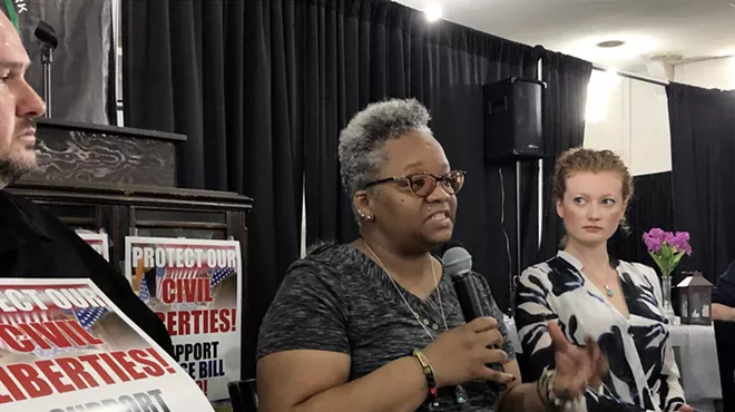 Tawana Petty, data justice director of the Detroit Community Technology Project, speaks at the town hall. Also pictured is Clare Garvie, a senior associate at Georgetown Law's Center on Privacy and Technology.