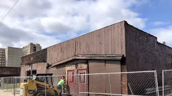 Crews prepare for demolition of the Gold Dollar on Thursday.