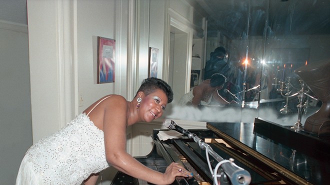 Aretha Franklin entertaining at her home during one of her Christmas parties.