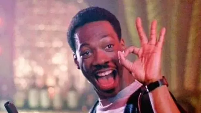 Hell, no, that's not Gil Hill. It's Eddie Murphy. But would you have clicked on it if it were Gil Hill? (Still from "Beverly Hills Cop," 1984, Paramount Pictures)