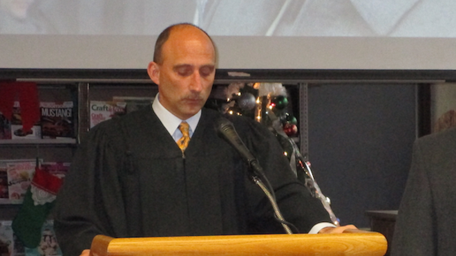 Judge Paul J. Paruk presiding over the inauguration of incoming and re-elected members of Hamtramck's City Council this January.