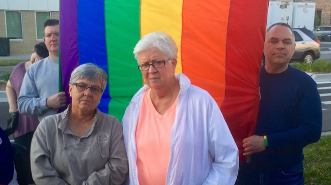 Rose O'Day, 62, left, with wife Kathy Huebener, 71, at a Sunday vigil at Ferndale City Hall for mass shooting victims in Orlando. A couple for 25 years, the Warren women married in October after same-sex marriage became legal in Michigan.