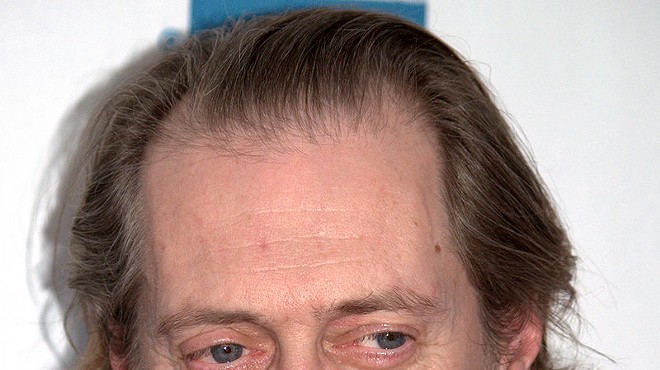 A guy named Kevin replaces family photos with Steve Buscemi's face