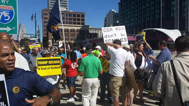 Image: Trump gives tame speech to DEC, protesters stir things up