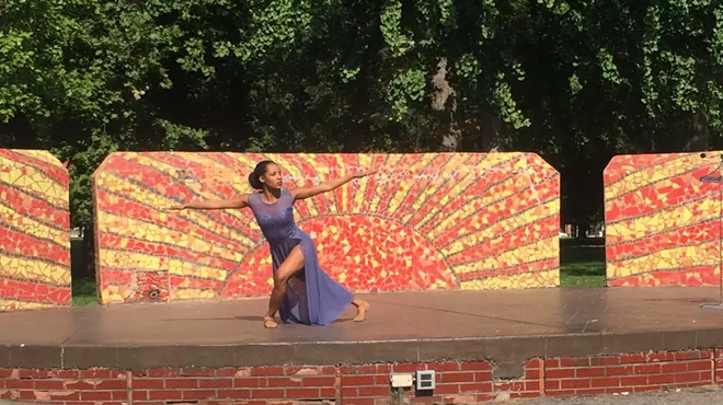 The Detroit-Windsor Dance Academy's Amber Moore performs "Crowned" during an Open Streets event at Clark Park on Tuesday.