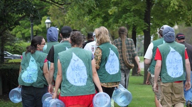 A demonstration in 2015 involved theatrically appropriating water from the Manoogian Mansaion in August 2015.