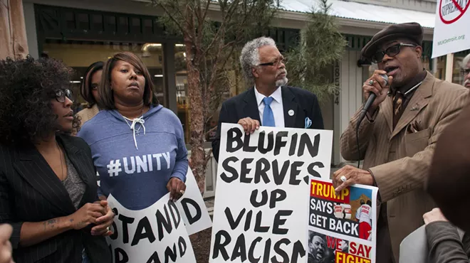 Protestors outside Bluefin on Wednesday afternoon.