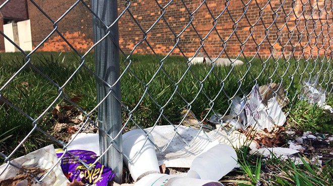 Trash along one of Henry Velleman's fences pictured earlier this week.