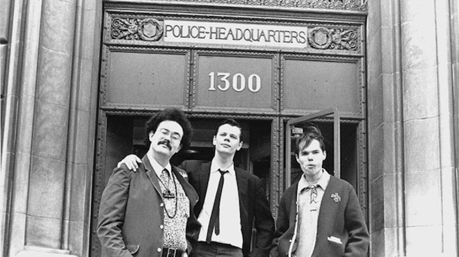 John Sinclair, Joe Mulkey and Billy Reid of the Detroit Artists Workshop after obtaining the license to hold the Love-In from the City of Detroit at Police Headquarters at 1300 Beaubien in the spring of 1967.