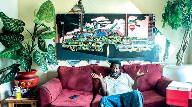 Detroit artist “Bird,” photographed at his home and studio. Vergara's book has Bird asking, "How come people from all over the world are coming to Detroit and making it and people from here can't get shit?"