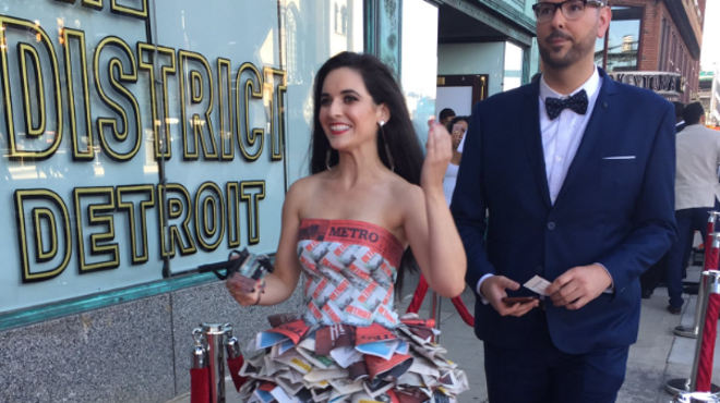 A woman wore a dress made out of 'Metro Times' to the 'Detroit' movie premiere